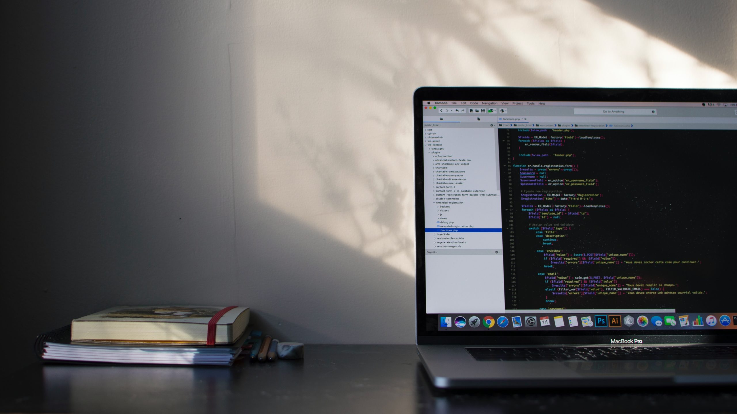 macbook with html code displayed