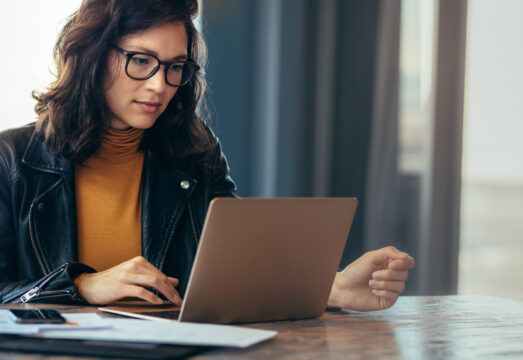 Asian woman working laptop at office