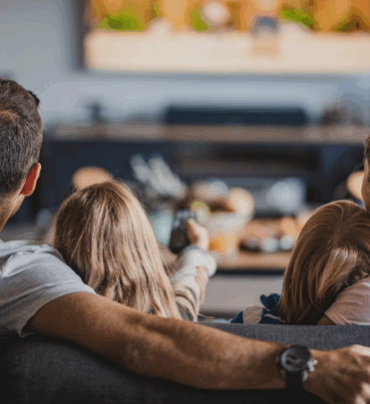 Family watching tv